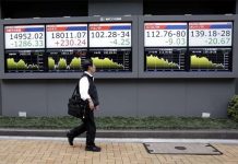 Asian shares fall as investors await new Fed leader