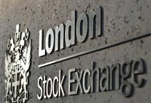 FTSE edges higher as earnings cheer offsets U.S. data jitters ahead of BoE decision