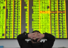 Asia shares edge higher as US government shutdown concerns weigh on markets