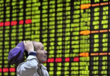 Asian stock markets fall, as U.S expected to hike rates faster