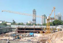 Finance adviser chairs meeting to review progress of development projects