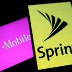 Smartphones with the logos of T-Mobile and Sprint are seen in this illustration