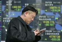 Asian shares mixed amid silence on China-US trade talks