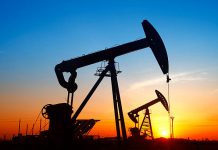 Oil falls as Saudi and Russia quietly agree output rise, U.S. stocks swell