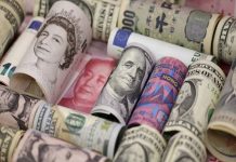 Dollar extends two-week run of gains, data eyed