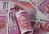 Indian rupee hits record low above 90 against U.S. dollar amid weak flows