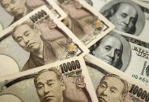 Dollar buoyant after upbeat data, hits nine-month high vs. yen
