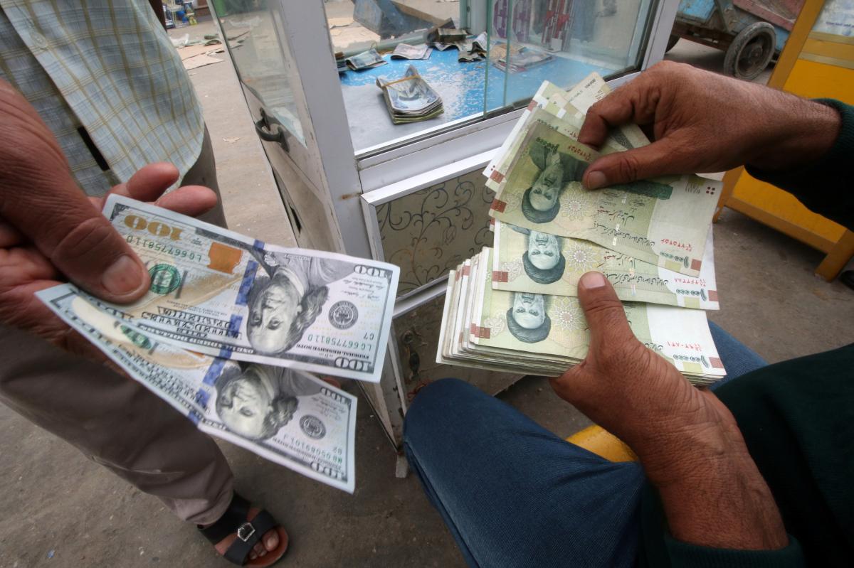 US reimposes tough curbs on Iran, Tehran hits at 'bullying'