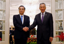 China calls for open world economy but work remains on landmark trade pact