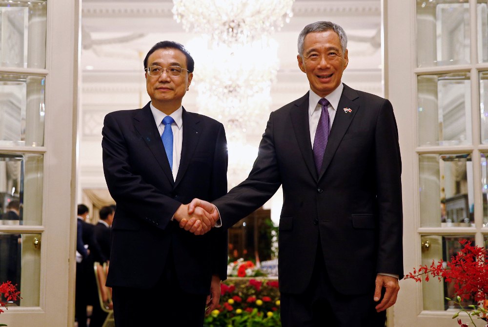 China calls for open world economy but work remains on landmark trade pact