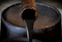 Oil rises to $51 after steep slide; growth fears weigh