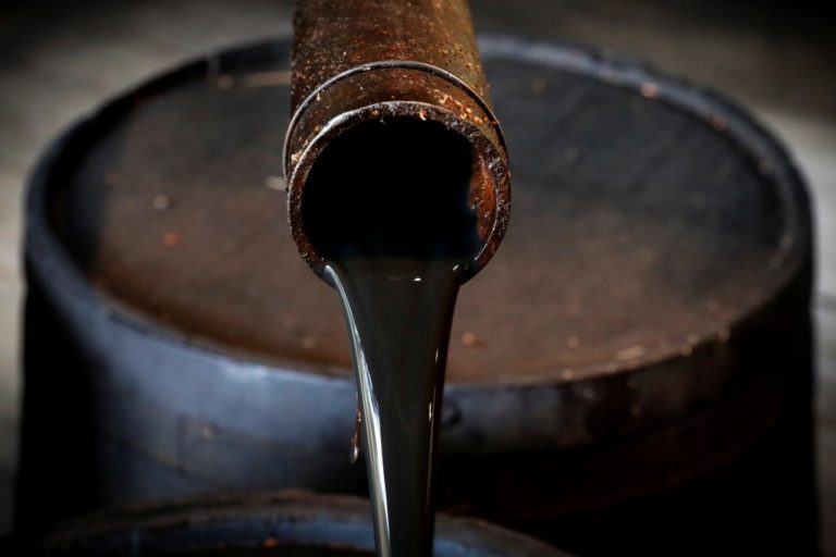 Oil rises to $51 after steep slide; growth fears weigh