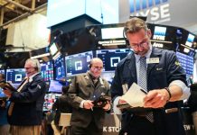 Trade progress boosts Wall Street at end of rough year