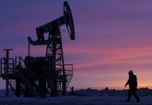 Oil gets a boost from Saudi output pledge, declining US inventories