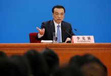 China pledges to expand financial market opening as US trade delegation arrives