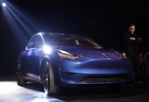 Tesla unveils Model Y as electric vehicle race heats up