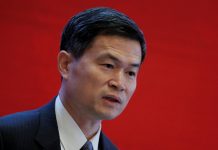 China can speed up financial sector opening, official says