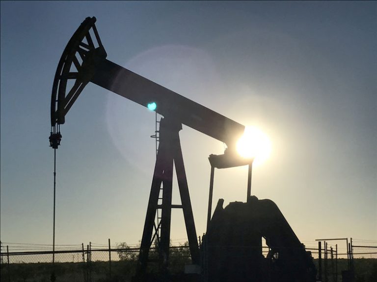 Oil up near $68 as supply cuts outweigh economic worry