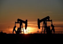 Oil defies trade fears as prices rise on tight supply