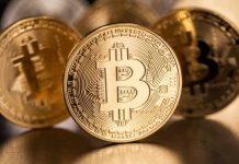 Bitcoin holds above $7,000 after hitting nine-month high