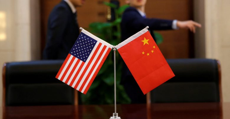 After Huawei blow, China says US must show sincerity for talks