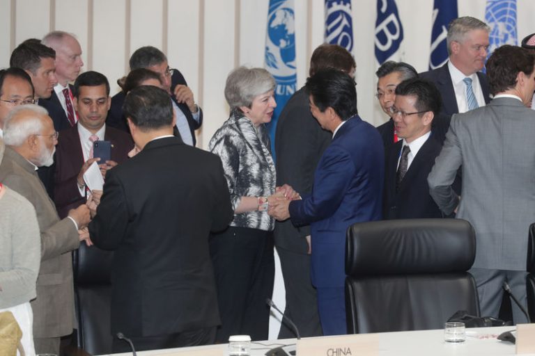 G20 stops short of denouncing protectionism, warns of global slowdown