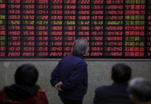 Asian markets tumble on trade tensions