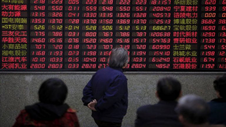 Asian markets tumble on trade tensions
