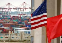 China warns its companies on US travel, rebuffs trade criticism