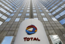 Total plans $5bn in asset sales as second-quarter profit falls