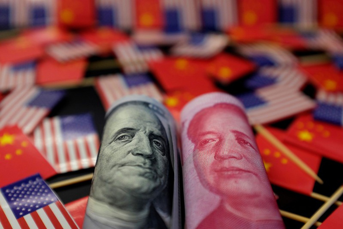 China's yuan breaks below 7 to the dollar, an 11-year low