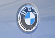 BMW profits dented by electric vehicle investment costs