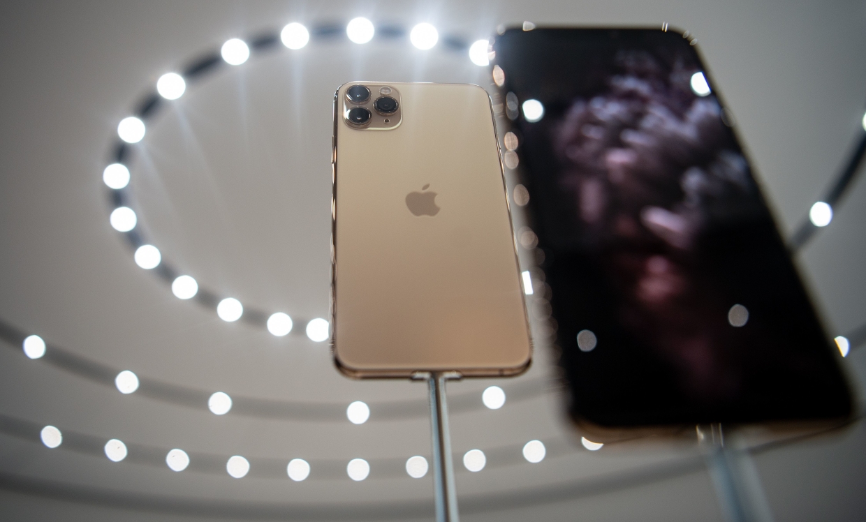 Apple's new, lower priced iPhone draws tepid response in Asia