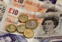 Pound strikes near three-year dollar low on Brexit turmoil