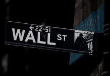 Trade optimism, earnings power Wall Street to fresh record high