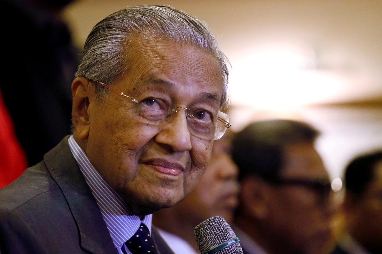 Malaysia to examine ringgit's fall as import costs sting: Mahathir