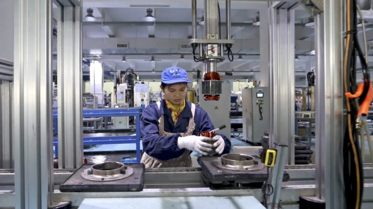 China’s factory activity unexpectedly returns to growth in Nov