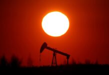 Oil declines but set for third weekly rise