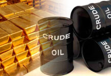 Gold at a high as oil slips lower