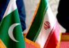 Pakistan, Iran agree to deepen trade, push for $10bn annual target by 2028 Iran Pakistan flags