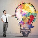 Concept of Creative business idea with colorful lightbulb