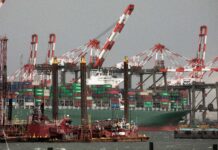 US trade deficit widens as exports hit 10-year low