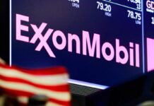 Exxon posts second straight quarterly loss on demand, price plunge
