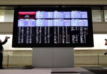 Stocks crumble as hopes fade for imminent Fed rate cut