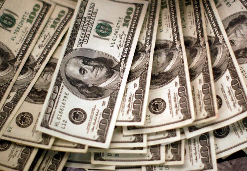 Dollar rises versus risky currencies as coronavirus surges, US stimulus hope fades