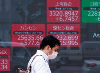 Asian markets stall as investors turn cautious ahead of Nvidia earnings amid AI valuation concerns