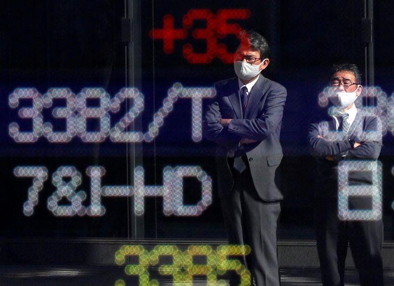 Biden transition and vaccine hopes drive up stocks, oil and bitcoin