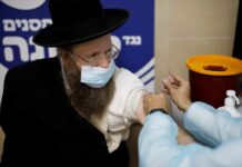 Pizza-sized boxes and paying a premium: Israel’s Covid-19 vaccine rollout