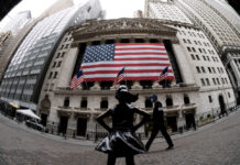 Wall Street climbs on strong jobs data as tech rebounds and Tesla recovers