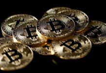 Bitcoin steams to new record and nears $1 trillion market cap